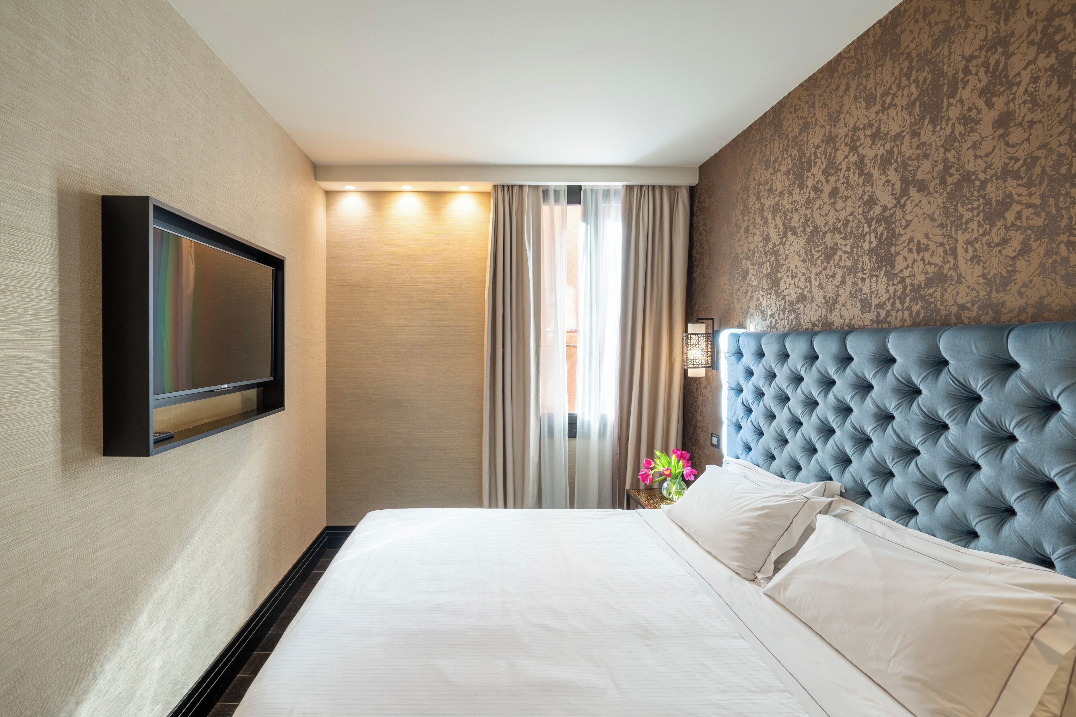 Premium bedding, down comforters, in-room safe, blackout drapes
