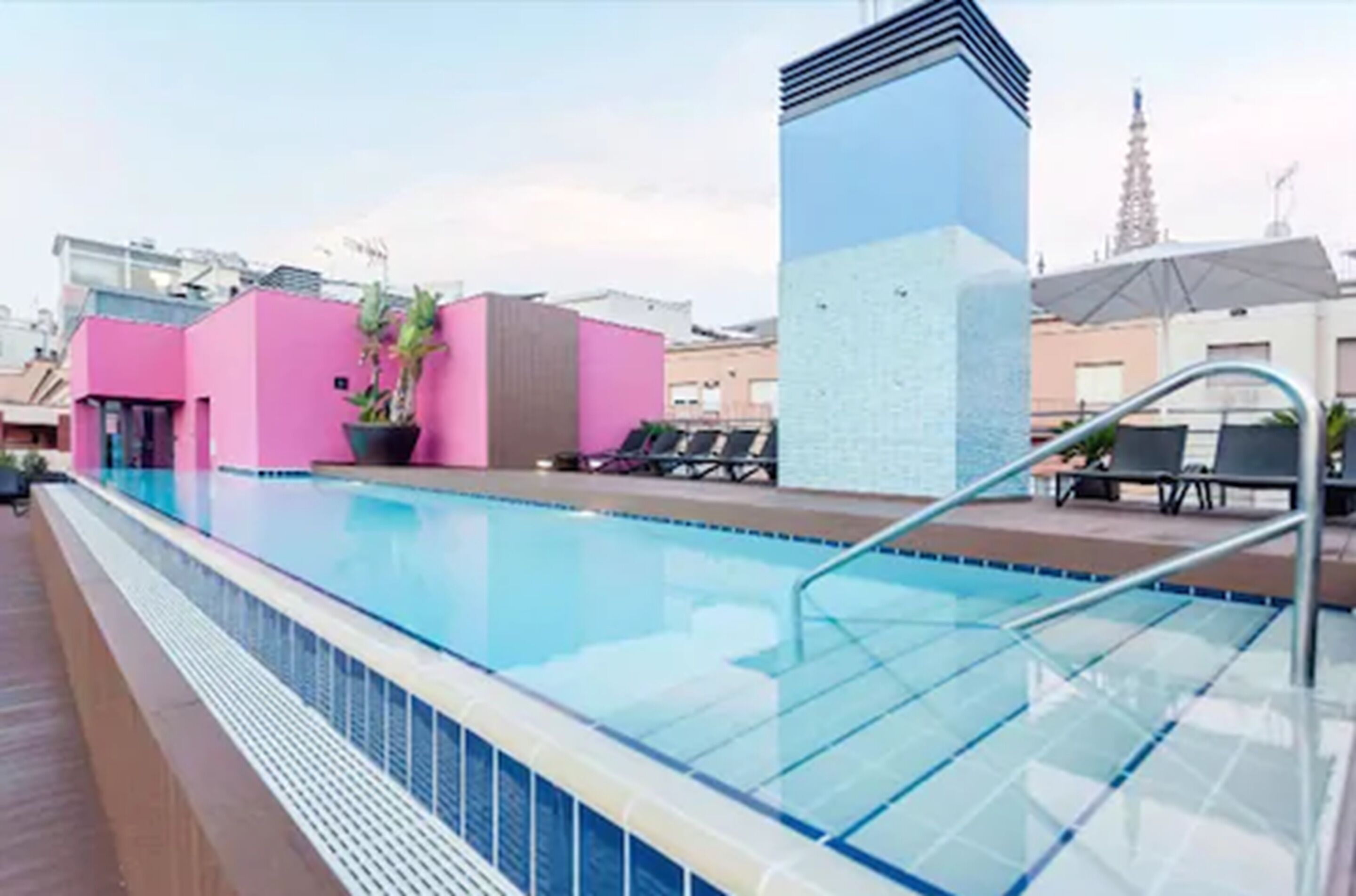 outdoor pool, pool umbrellas, pool loungers