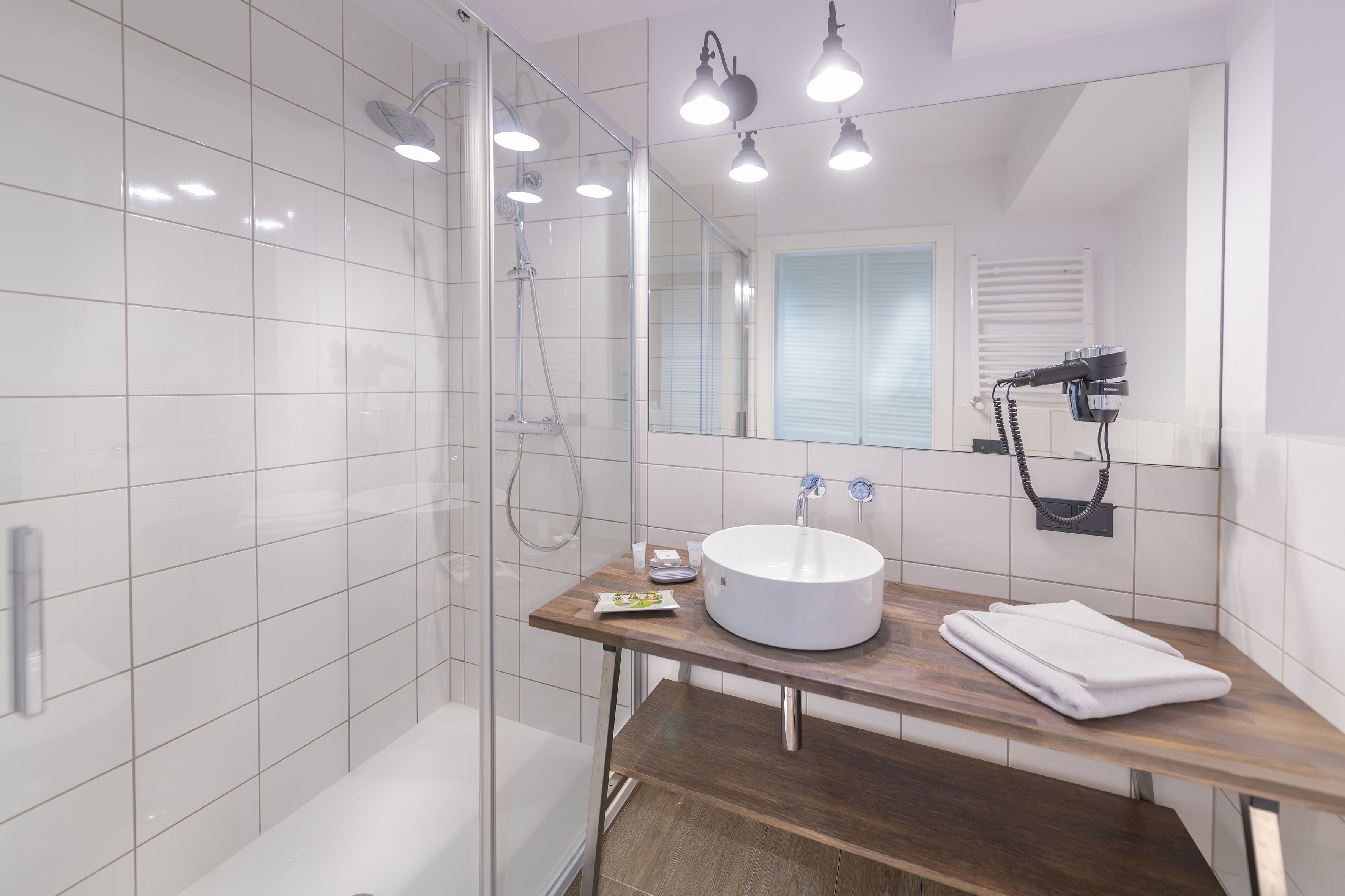 premium room | bathroom | shower, free toiletries, hair dryer, bathrobes
