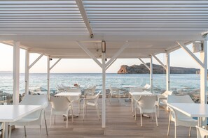 Lunch, dinner served; international cuisine, beach views 