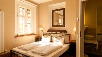 Desk, laptop workspace, iron/ironing board, cribs/infant beds