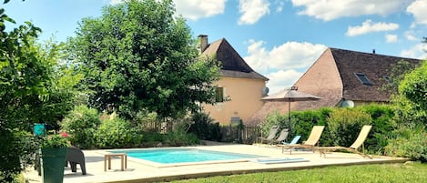 Seasonal outdoor pool, pool umbrellas, pool loungers