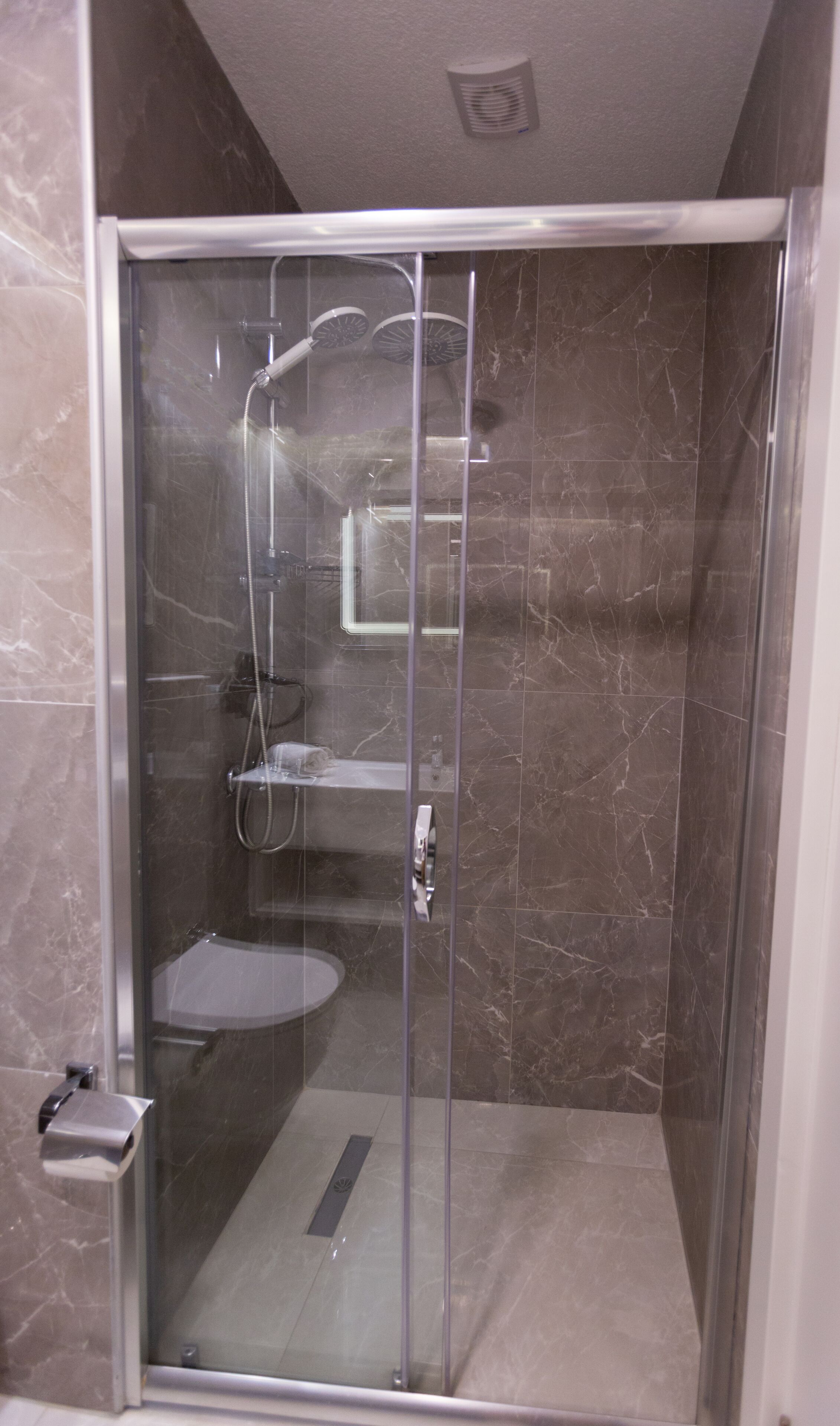 shower, free toiletries, hair dryer, slippers