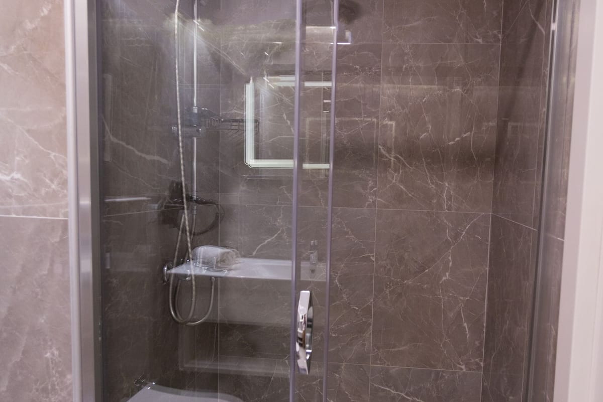 shower, free toiletries, hair dryer, slippers