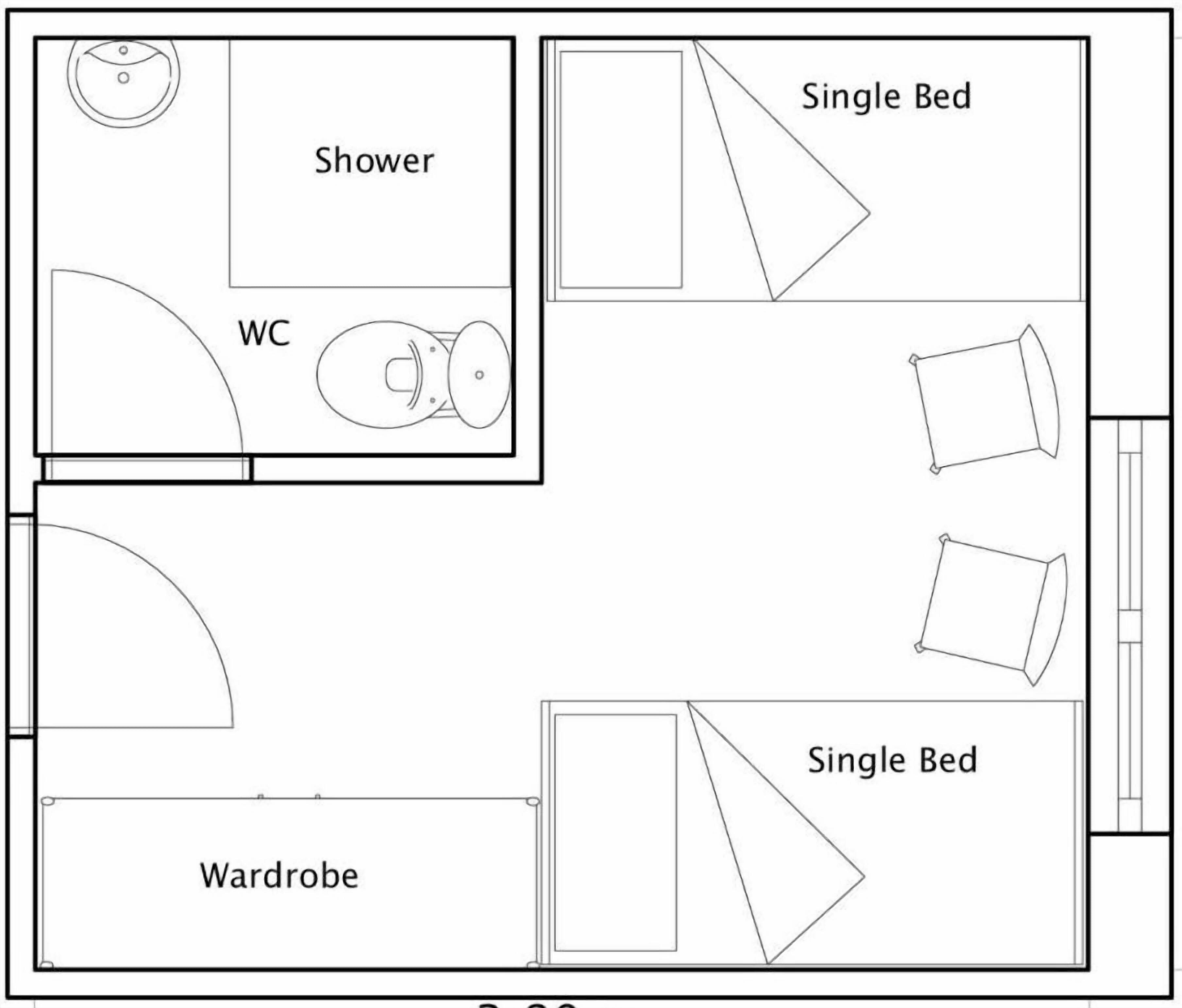 A floor plan with a shower, WC, single bed, and wardrobe.