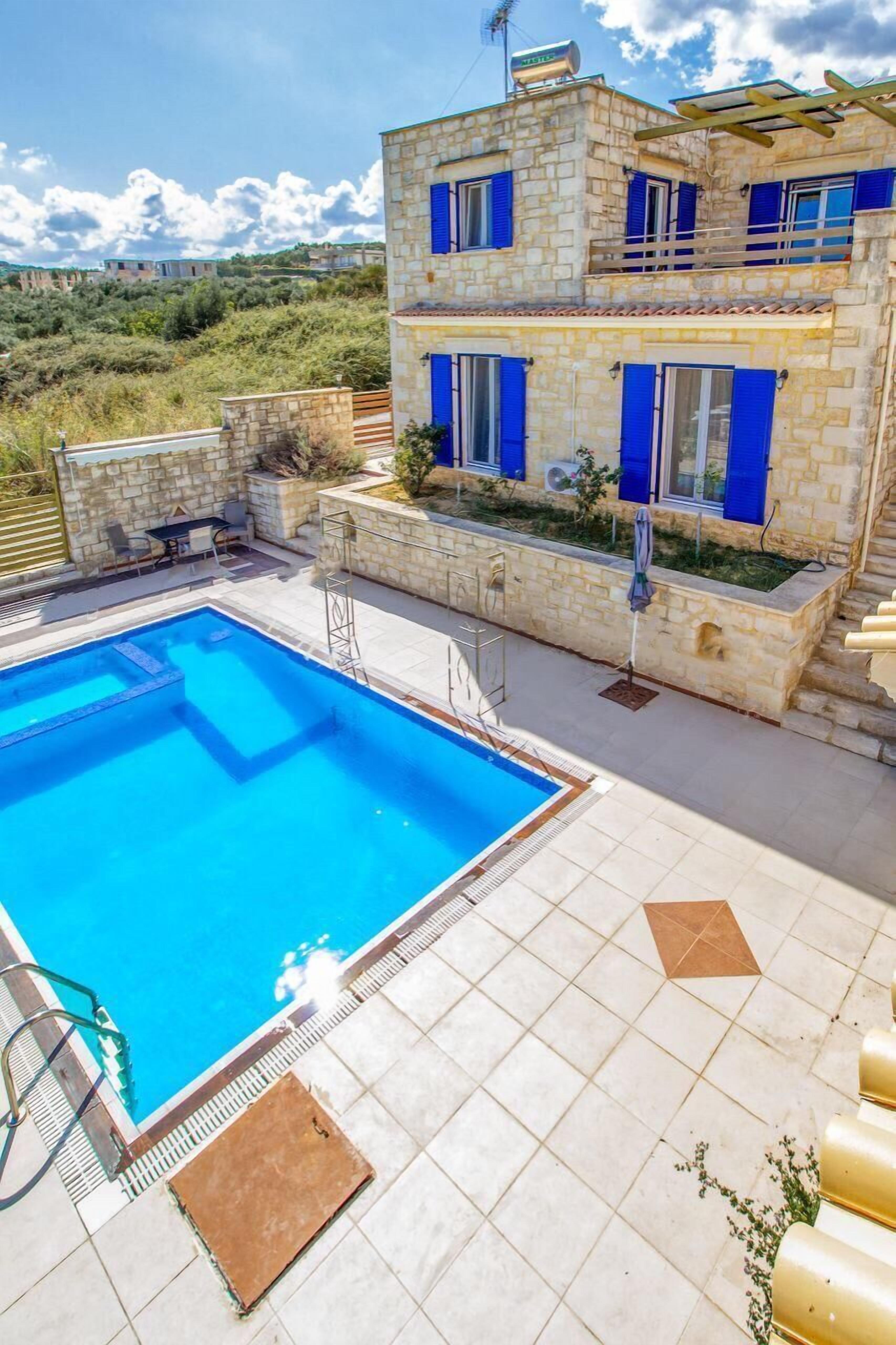 Indoor pool, outdoor pool, pool umbrellas, pool loungers