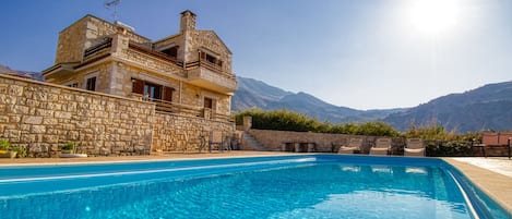 Indoor pool, outdoor pool, pool umbrellas, sun loungers