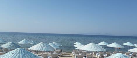 Private beach, sun loungers, beach umbrellas