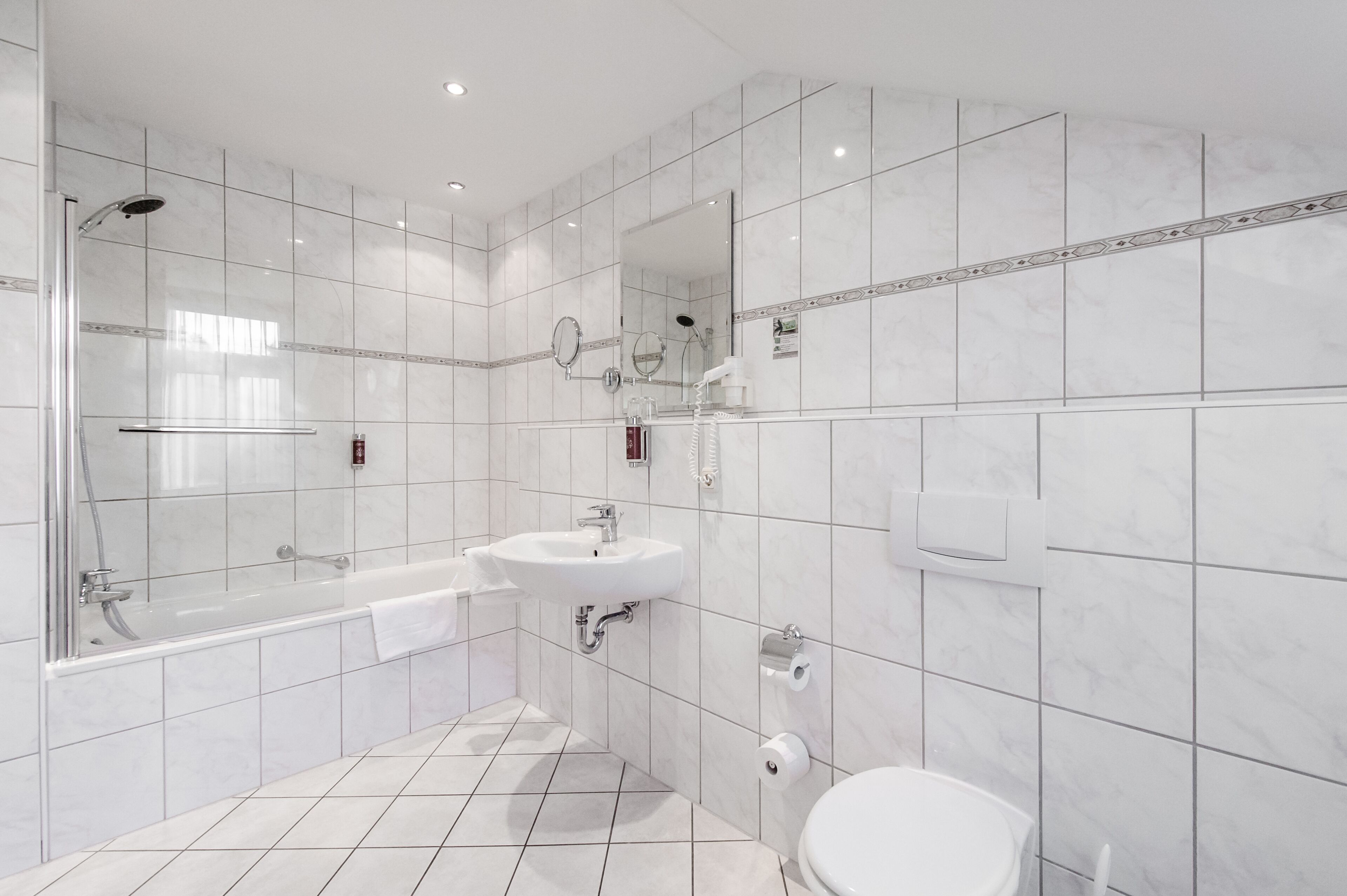 superior double room | bathroom | free toiletries, hair dryer, towels