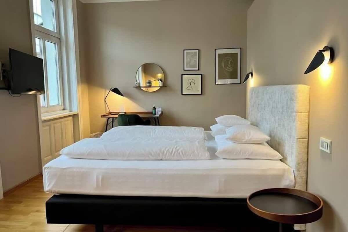 Hypo-allergenic bedding, minibar, in-room safe, desk
