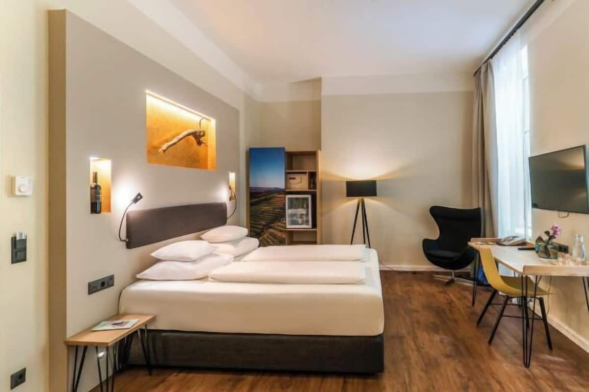 Hypo-allergenic bedding, minibar, in-room safe, desk