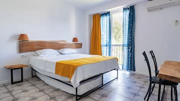 Family Suite, 2 Bedrooms | Premium bedding, minibar, individually decorated, iron/ironing board