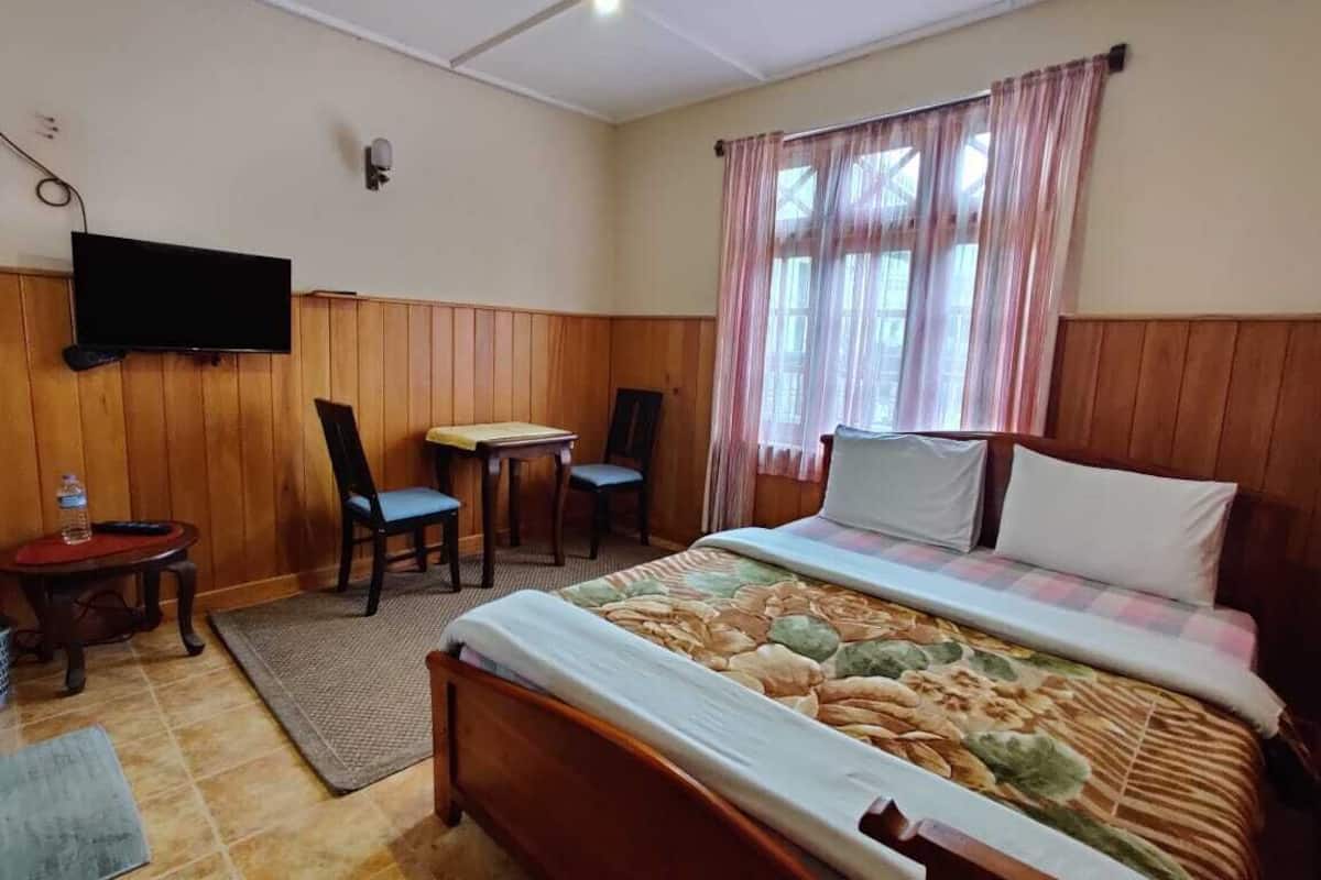 deluxe double room | premium bedding, desk, laptop workspace, free wifi