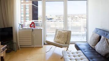 Luxury Penthouse, 2 Bedrooms, Beach View, Beachfront | Living room | Flat-screen TV, DVD player