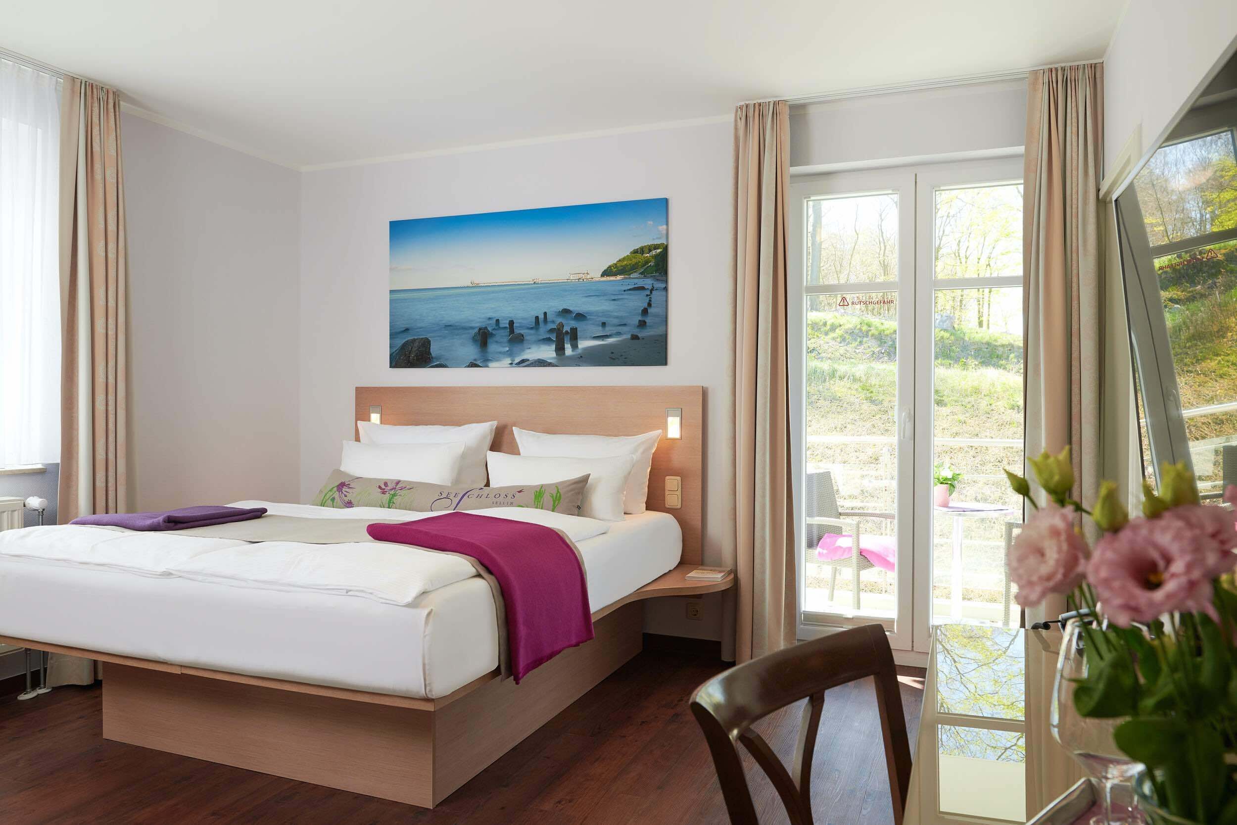 double room, balcony | living area | flat-screen tv