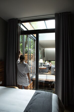 Family House, 2 Bedrooms, Refrigerator & Microwave, Garden Area | Premium bedding, in-room safe, blackout drapes, iron/ironing board