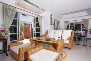 Comfort Villa, 4 Bedrooms | Living area | Flat-screen TV - Baan Phailin (Pattaya)