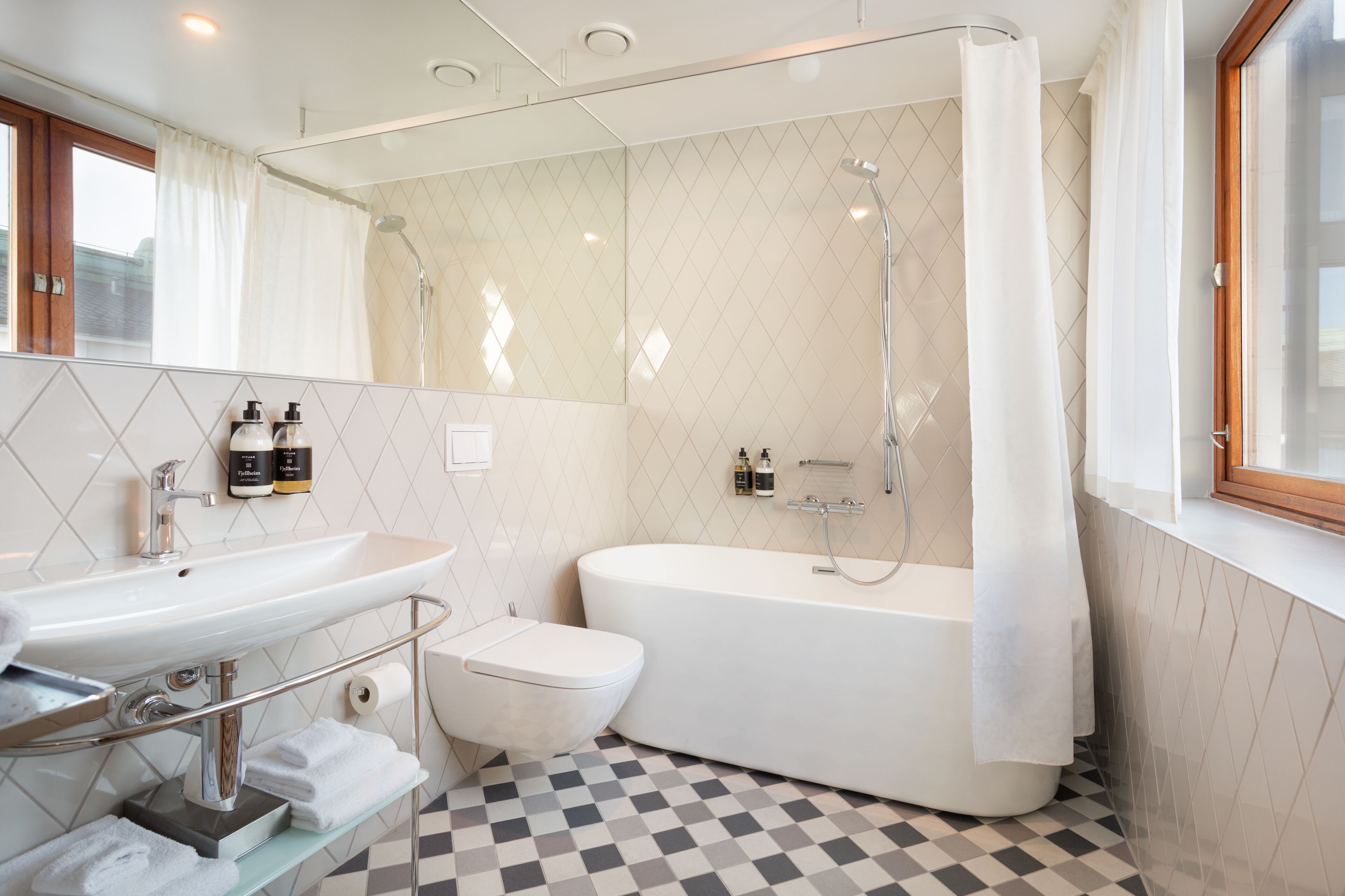 superior double room | bathroom | designer toiletries, hair dryer, slippers, heated floors