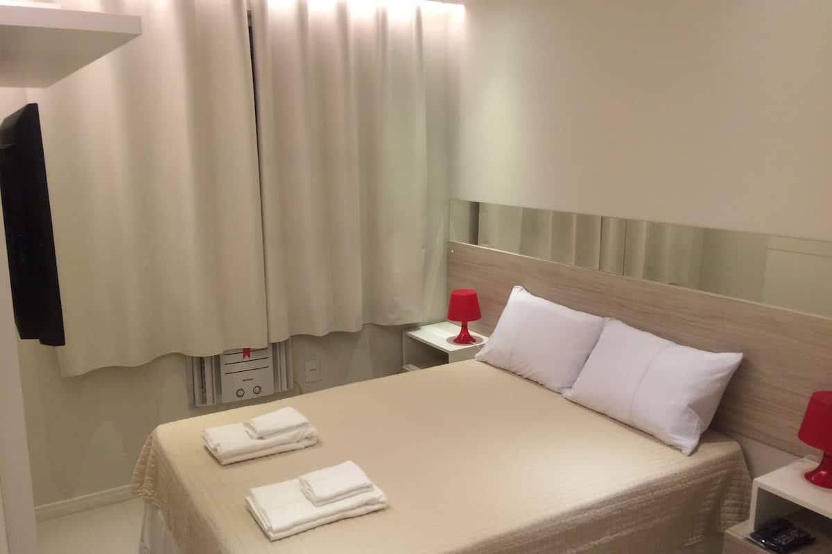 2 bedrooms, desk, blackout curtains, iron/ironing board