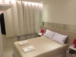 Traditional Apartment, 2 Bedrooms, Refrigerator & Microwave, Garden Area | 2 bedrooms, desk, blackout curtains, iron/ironing board