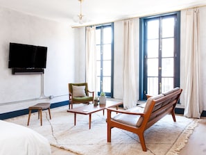 Tina - 2 Bedroom Loft (3rd Floor) | Living area | 55-inch flat-screen TV with cable channels, TV, iPad - Lokal Hotel - Old City (Philadelphia)