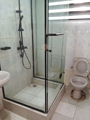 Standard Room | Bathroom | Shower, rainfall showerhead, free toiletries, towels - Peace Haven Hotel (Abuja)