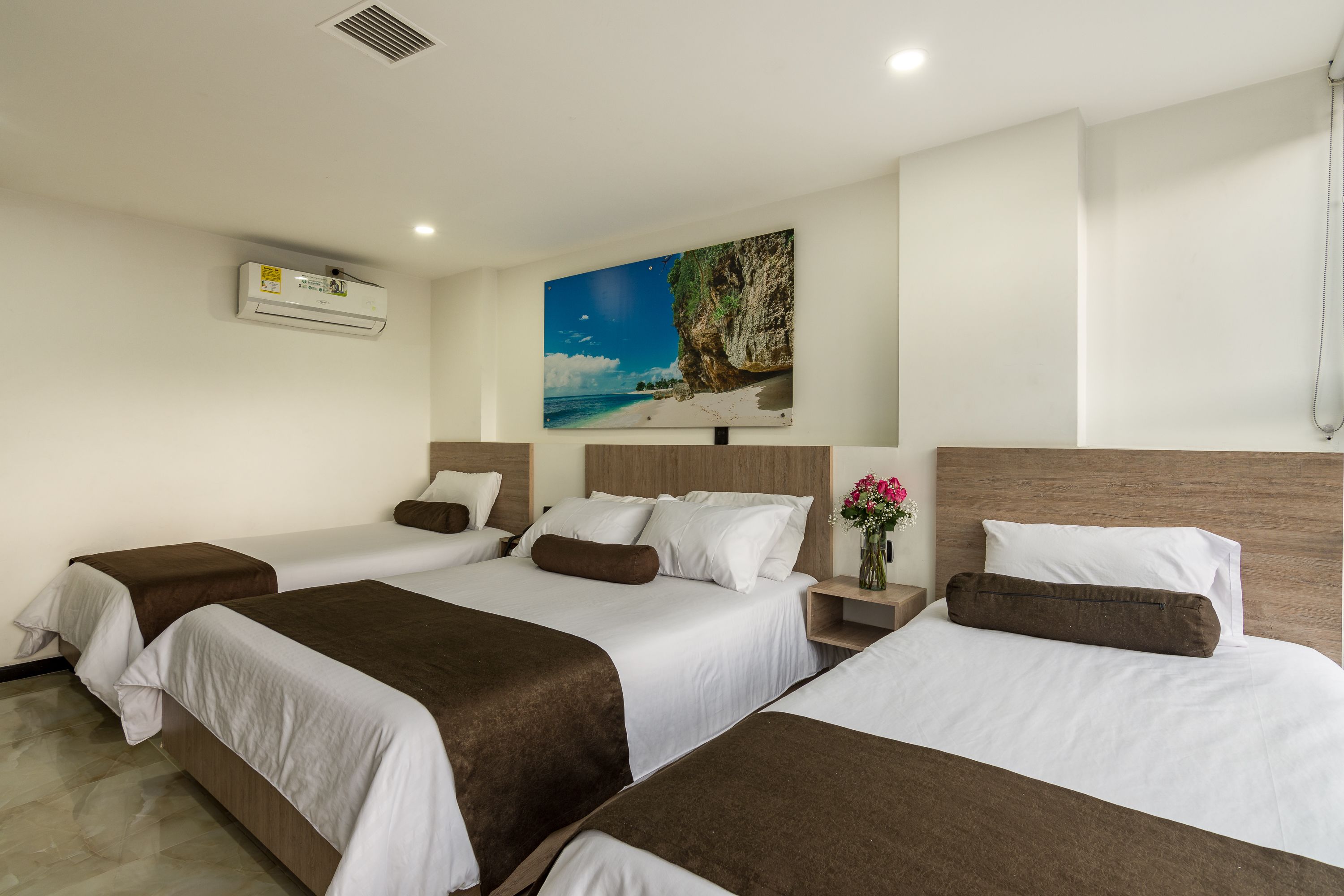 triple room | premium bedding, desk, laptop workspace, iron/ironing board