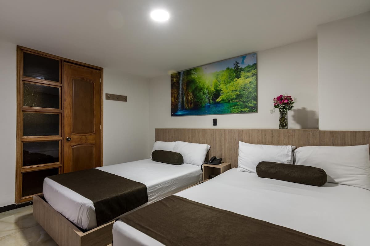 Premium bedding, desk, laptop workspace, iron/ironing board