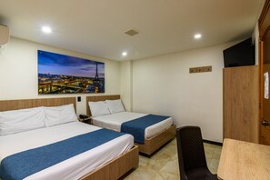 Family Double Room | Premium bedding, desk, laptop workspace, iron/ironing board - Hotel Med Estadio (Medellín)