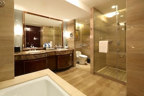 Separate tub and shower, free toiletries, hair dryer, bathrobes