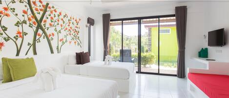 A modern hotel room with two beds, a large window with a view, a flat-screen TV, and a red accent wall.