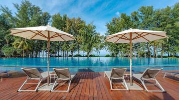 2 outdoor pools, pool umbrellas, pool loungers