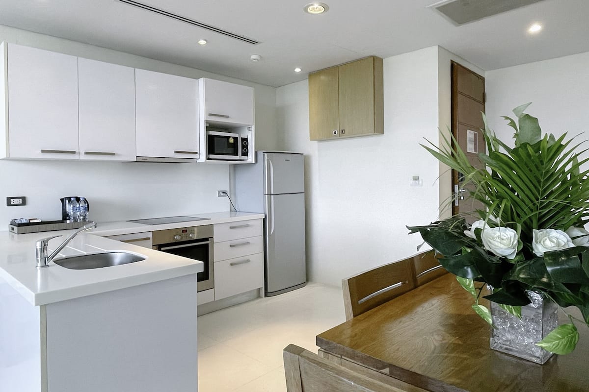 1 bedroom residence with kitchen and balcony | private kitchenette | fridge, microwave, cleaning supplies