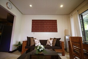 Appartement, 1 chambre | Salle de séjour | Télévision à écran plat