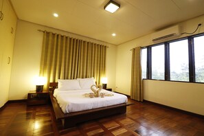 Apartment, 2 Bedrooms | In-room safe, desk, iron/ironing board, rollaway beds - Hassaram Courtyard (Dumaguete)