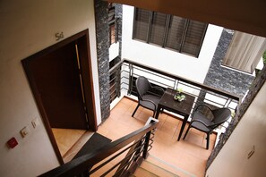 Apartment, 2 Bedrooms | In-room safe, desk, iron/ironing board, rollaway beds - Hassaram Courtyard (Dumaguete)