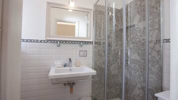 Double Room, Balcony | Bathroom | Shower, hair dryer, bathrobes, towels