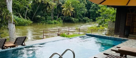 Outdoor pool, sun loungers