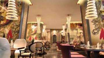 Breakfast, lunch, dinner served; international cuisine