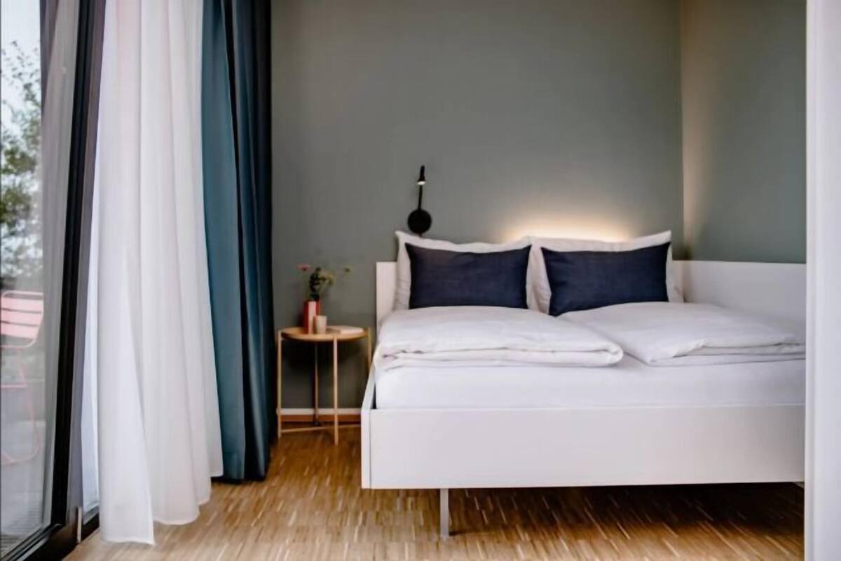 Premium bedding, down comforters, in-room safe, desk