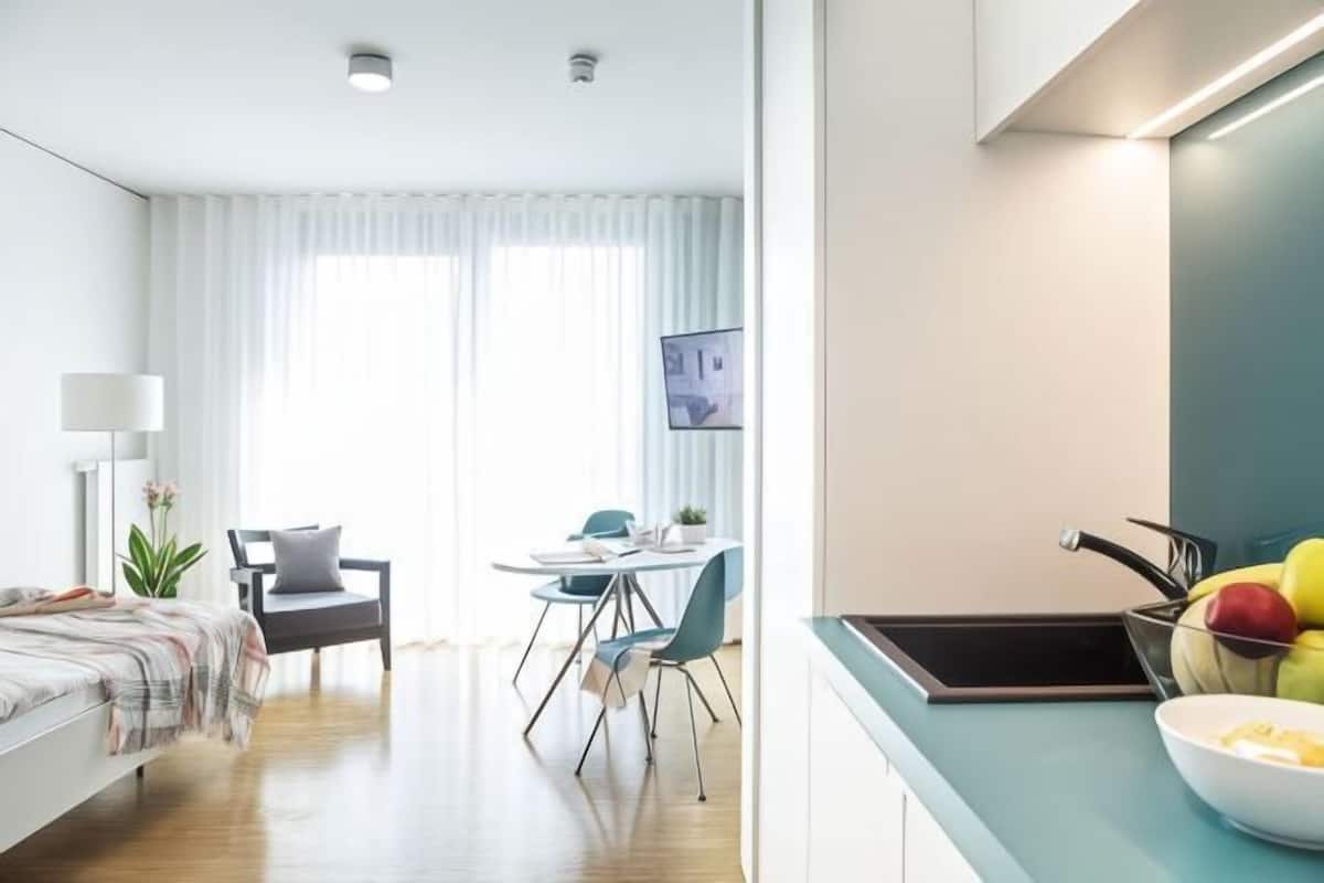 Premium bedding, down duvets, in-room safe, desk