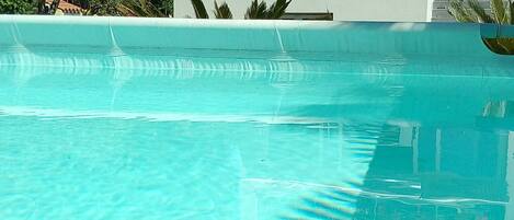 Outdoor pool, open 8:00 AM to 8:30 PM, pool umbrellas, sun loungers