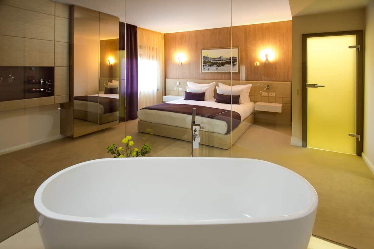 deluxe double room | premium bedding, minibar, in-room safe, desk