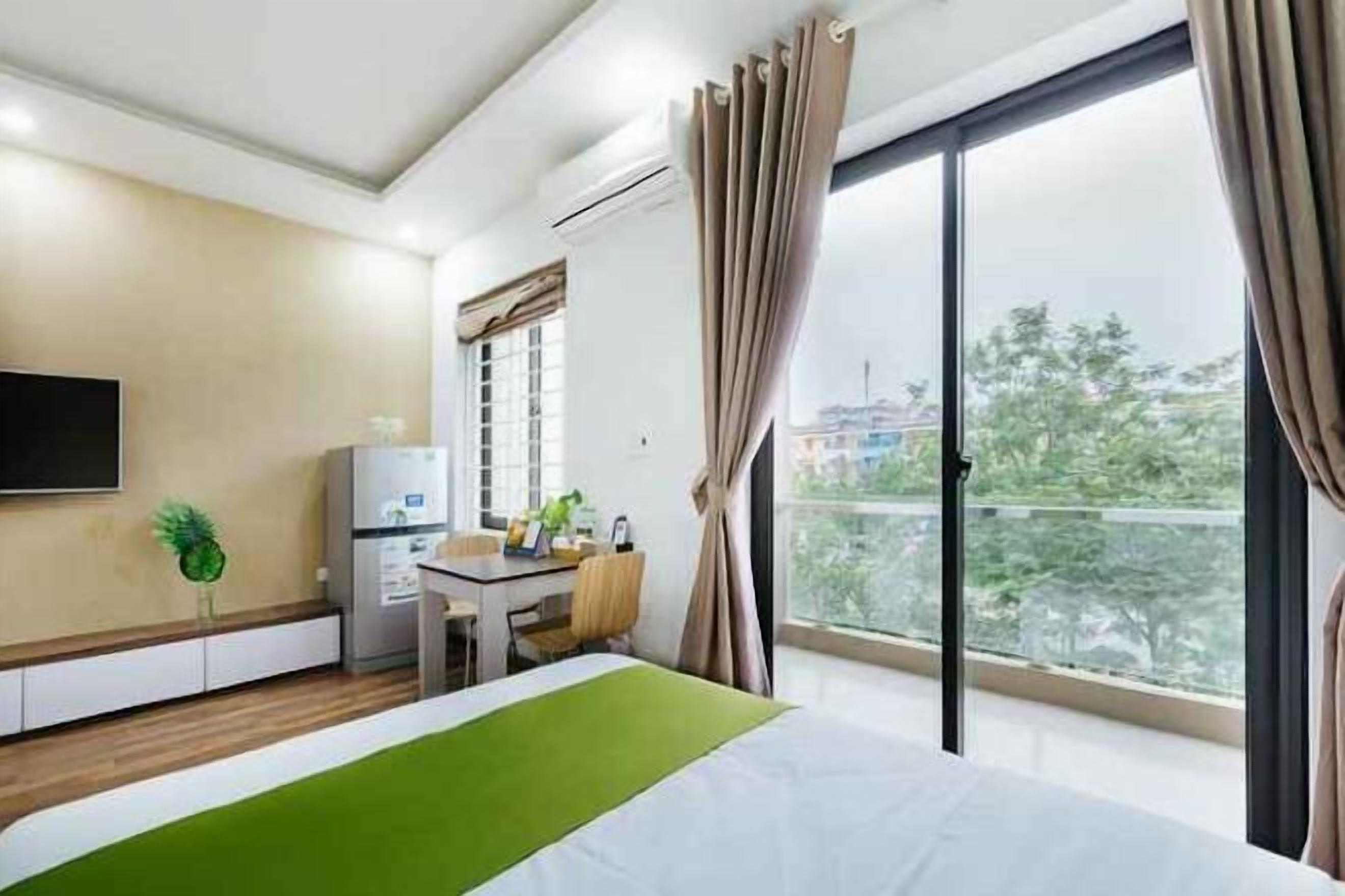 Minibar, desk, laptop workspace, blackout curtains