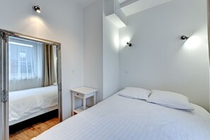Apartment, 1 Bedroom, Lake View | 1 bedroom, in-room safe, soundproofing, iron/ironing board