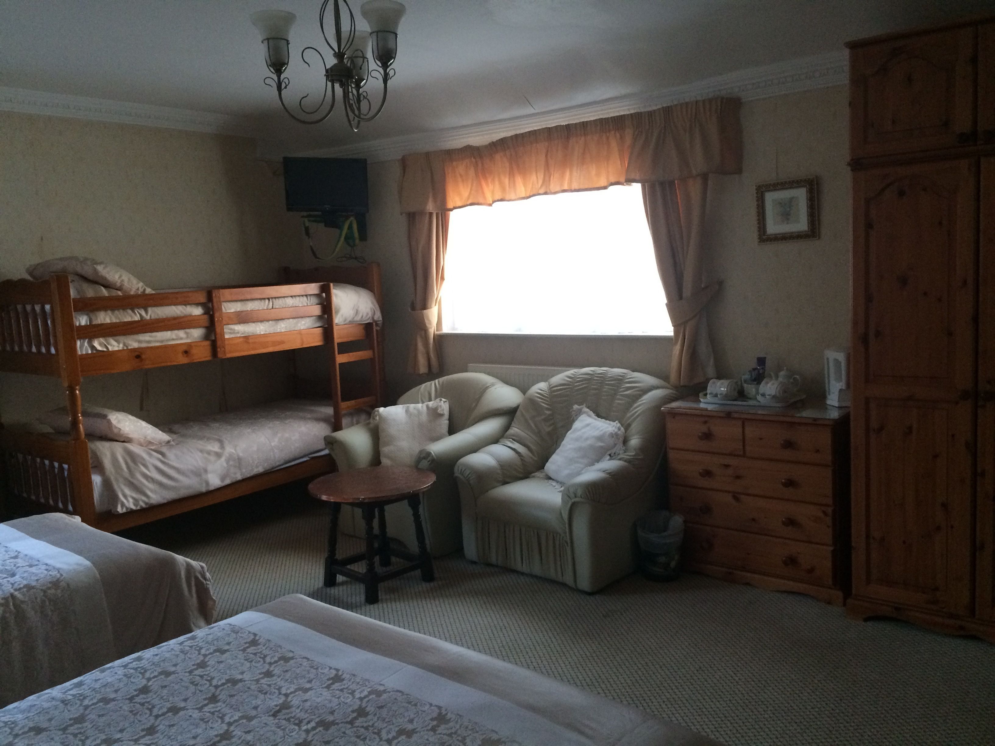 family room | desk, iron/ironing board, free cots/infant beds, free wifi