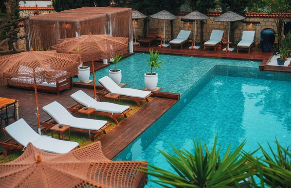 Outdoor pool, pool umbrellas, pool loungers