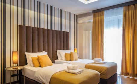 Deluxe Apartment, 2 Bedrooms, Terrace | 1 bedroom, desk, soundproofing, iron/ironing board