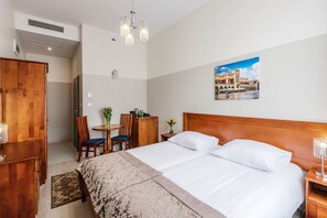 Standard Triple Room, 2 Bedrooms | In-room safe, desk, soundproofing, free WiFi