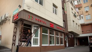 A hostel with a sign indicating a price of 149. - Z Hostel (Kyiv)